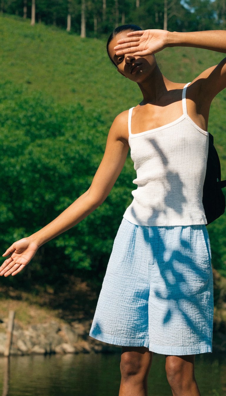 light blue seersucker shorts with white tank for hot humid camping day
